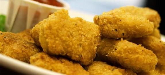 Chicken Nuggets on a Plate with Ketchup